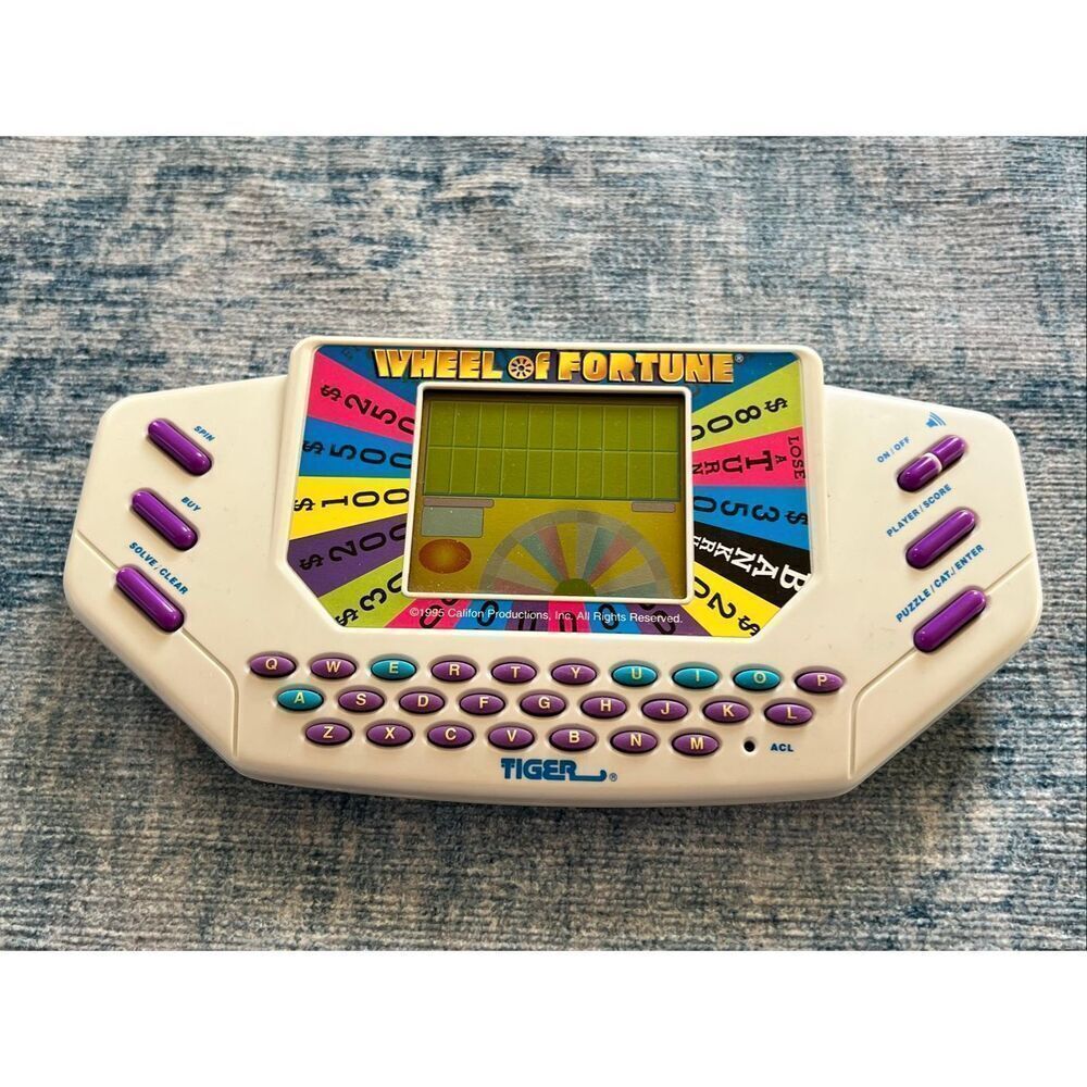 Vintage Tiger Electronics Handheld Wheel of Fortune Game